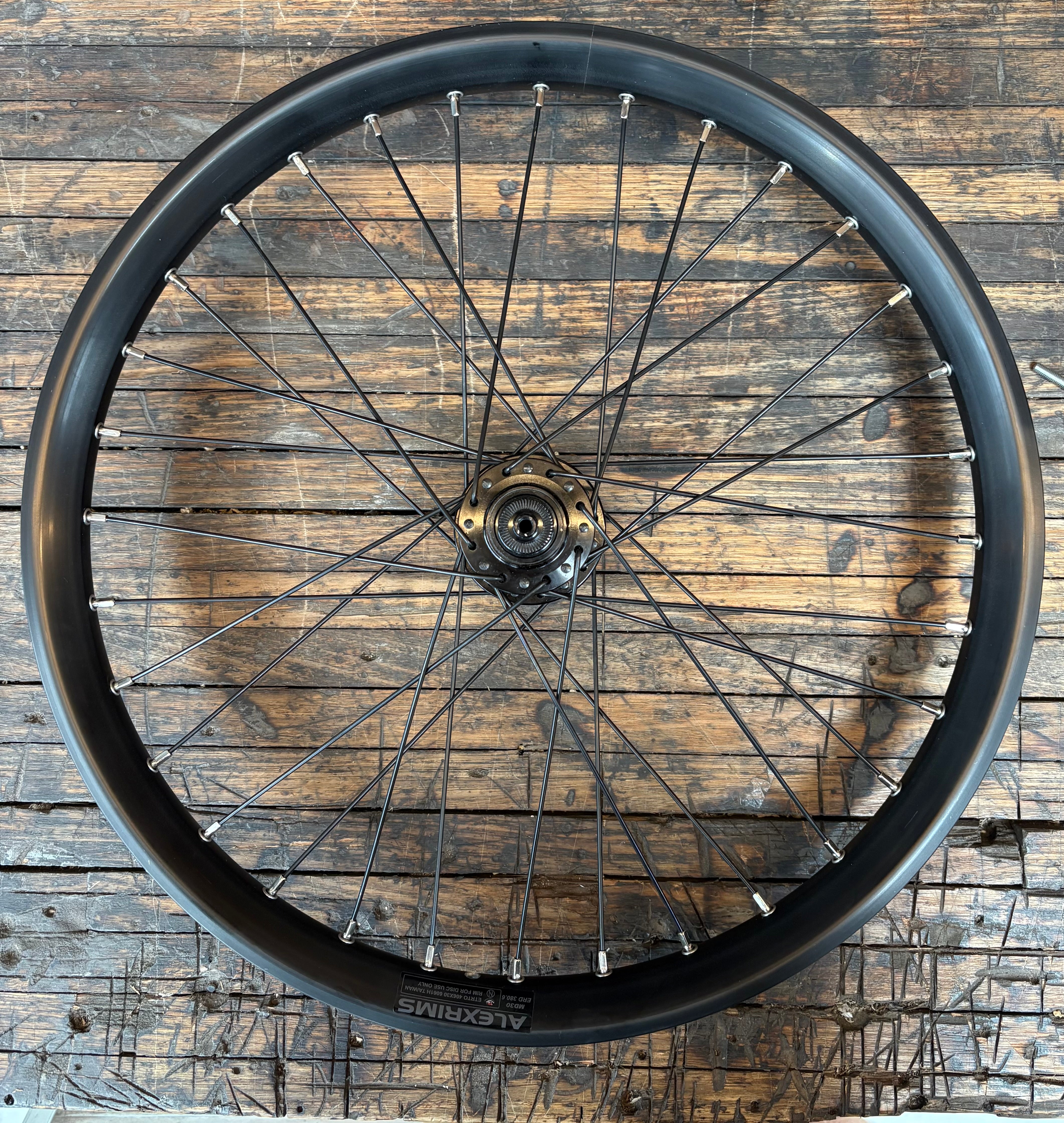 WHEEL - 20" Alex MD30 32H Black Rim, FRONT 3 in One (100mm OLD) 6 Bolt Disc Sealed Novatec Light Weight Black Hub, BLACK Spokes